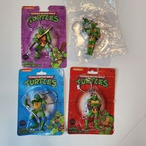 Nickelodeon 4 Teenage Mutant Ninja Turtles keychains new damaged boxes pls read